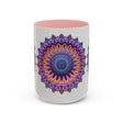 A close-up photo of a grey mug with a vibrant mandala design