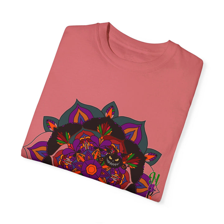 Orange unisex garment-dyed t-shirt featuring handmade pumpkin mandala art for Halloween