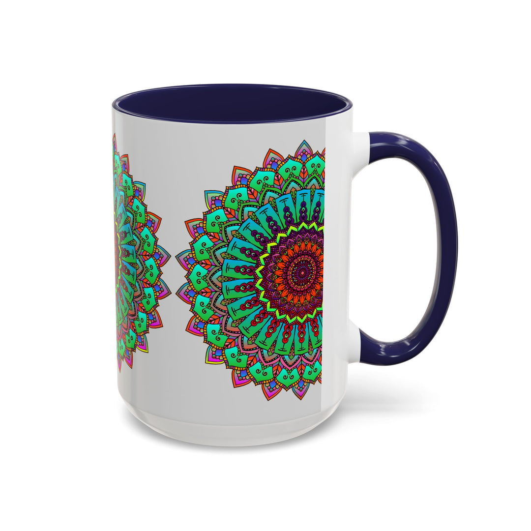 A ceramic mug featuring a mandala art design in light grey and colorful tones, perfect for enjoying your favorite hot beverages