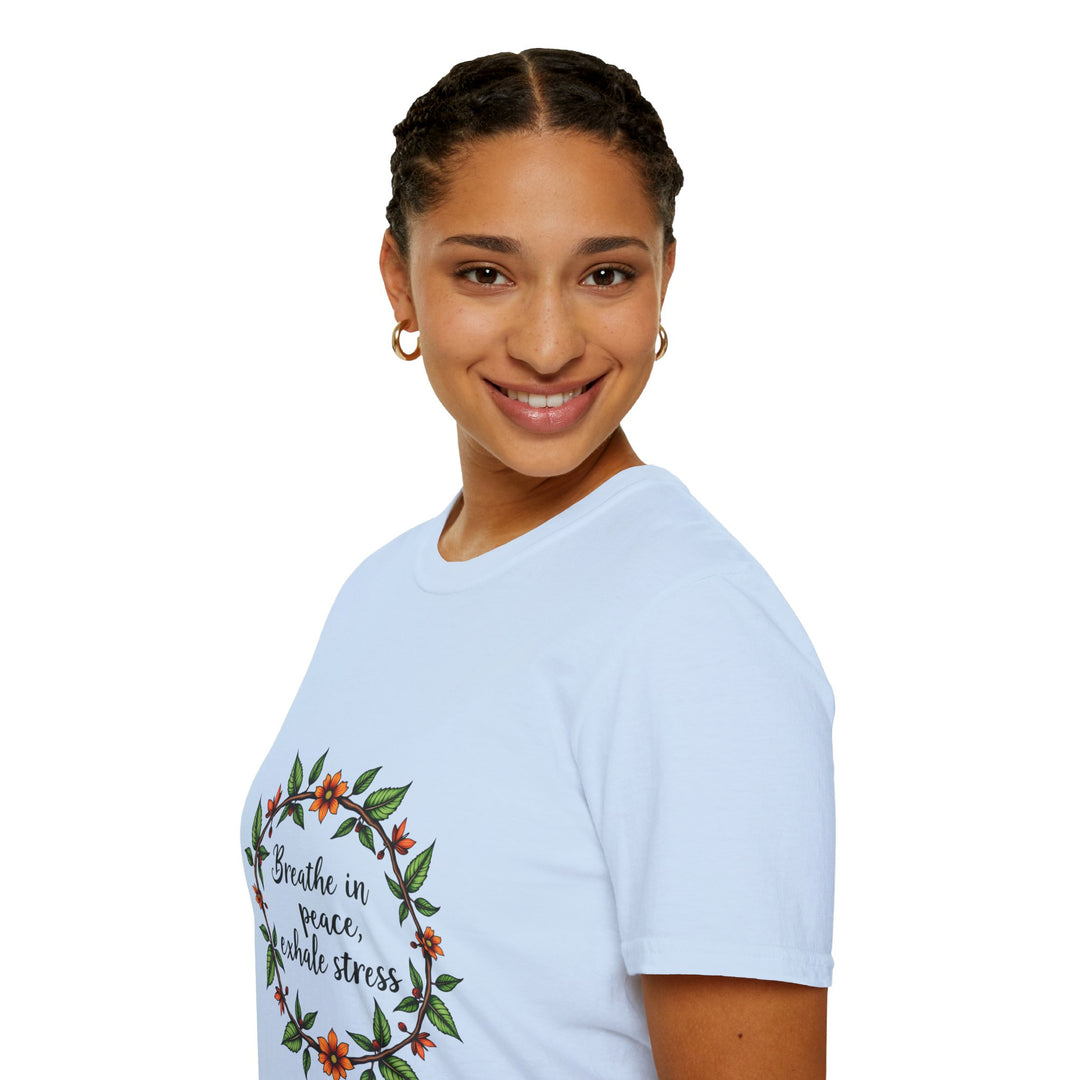 White t-shirt with a floral garland design and text reading 'Breathe in Peace Exhale Stress'