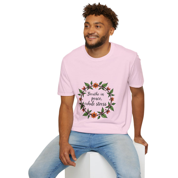 A beautiful white t-shirt with a delicate floral garland design, featuring the words Breathe in Peace Exhale Stress in elegant script, perfect for bringing a sense of calm and tranquility to your wardrobe