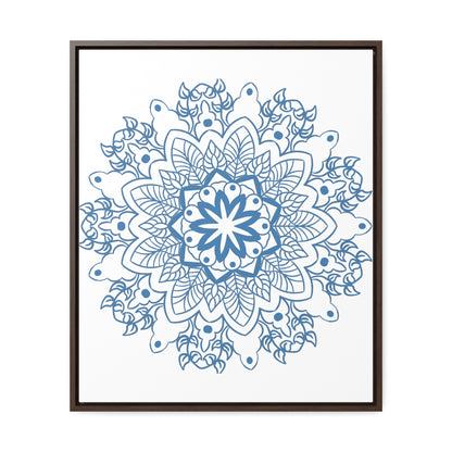 A vertical gallery canvas wrap featuring a steel blue handmade mandala design