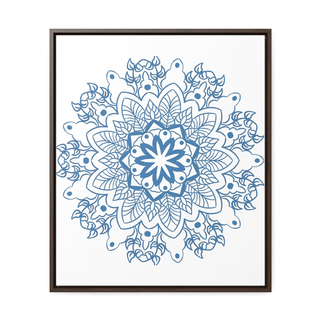 A vertical gallery canvas wrap featuring a steel blue handmade mandala design