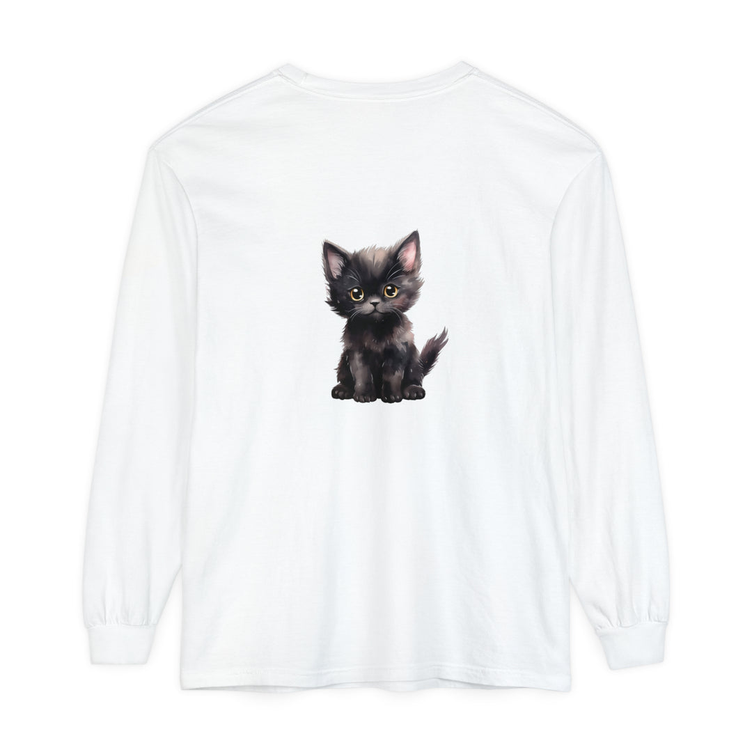 Adorable black kitten with striking yellow eyes on long sleeve t-shirt