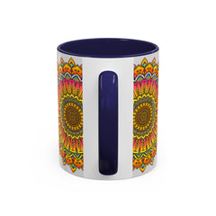 Vibrant and intricate mandala art adorns a ceramic mug, featuring a colorful floral design in shades of blue, red, and yellow
