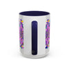 Mug with intricate mandala art featuring floral patterns on light grey background