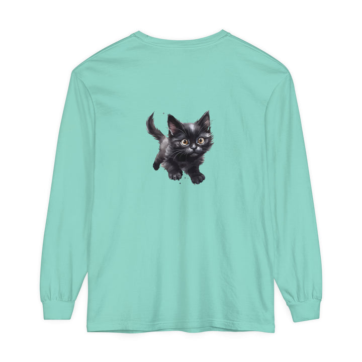 A colorful watercolor illustration of a playful kitten printed on a comfortable T-shirt