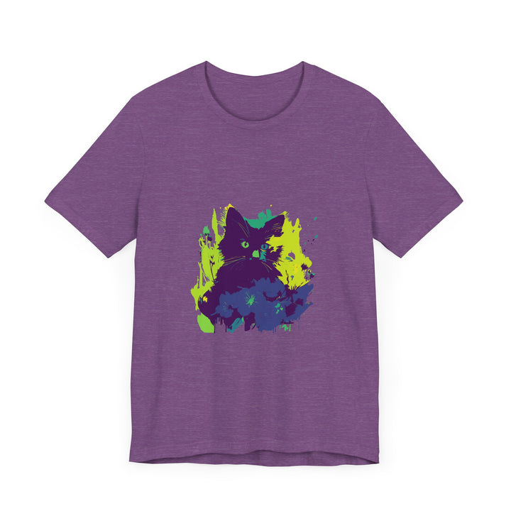 A black cat with glowing green eyes sits against a backdrop of swirling purple and blue abstract shapes, on a t-shirt