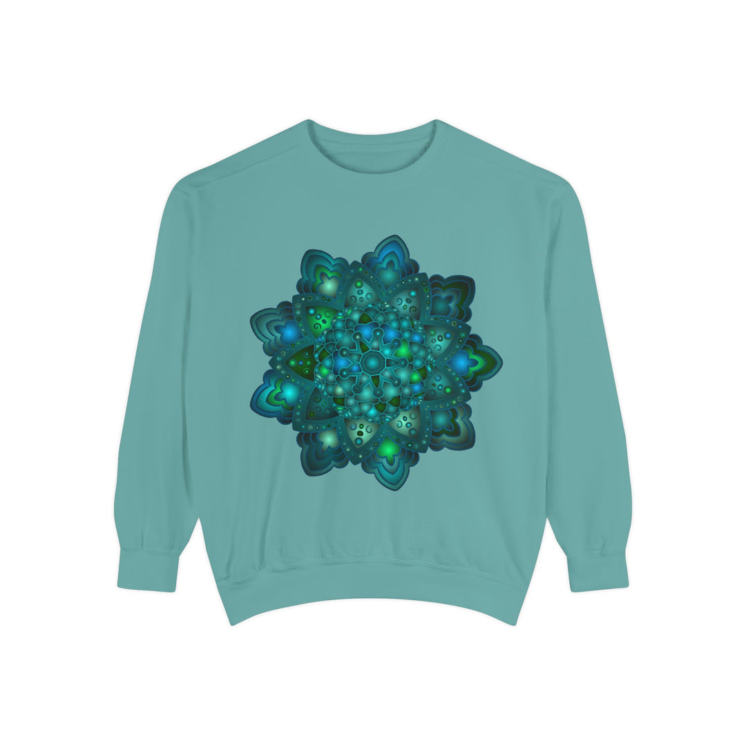 Intricate blue and green mandala sweatshirt featuring a mesmerizing design pattern