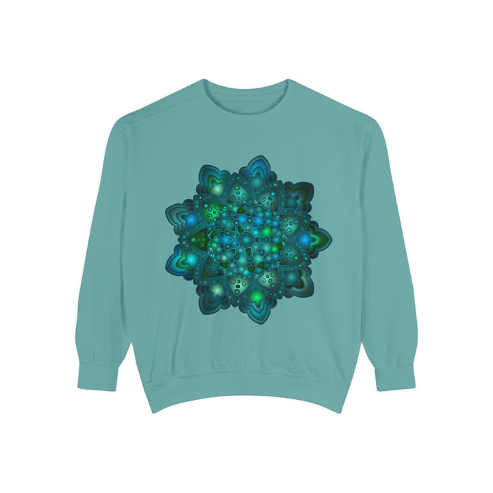 Intricate blue and green mandala sweatshirt featuring a mesmerizing design pattern