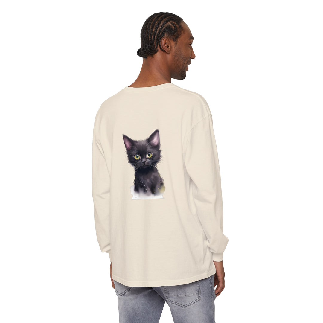 A close-up image of a cute black kitten with vibrant green eyes printed on a comfortable and stylish t-shirt