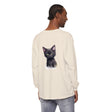A close-up image of a cute black kitten with vibrant green eyes printed on a comfortable and stylish t-shirt