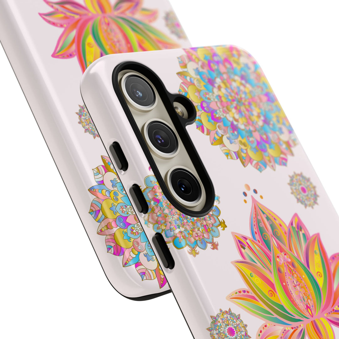 A light pink phone case with a mandala design and lotus flower illustration