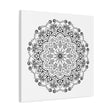 Handmade mandala art featuring intricate black and white designs on matte canvas, stretched and ready to hang on your wall