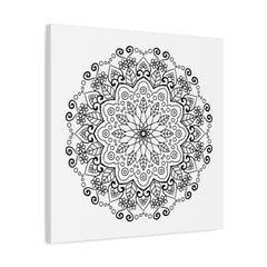 Handmade mandala art featuring intricate black and white designs on matte canvas, stretched and ready to hang on your wall