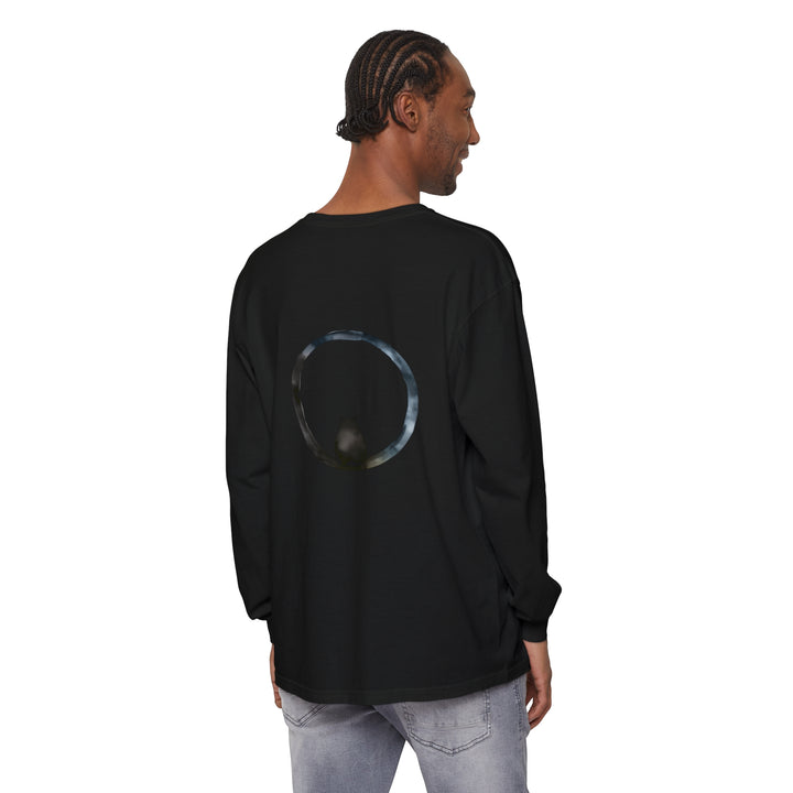 A close-up image of the Mystifying Sphere Unisex Long Sleeve T-Shirt, featuring a mesmerizing sphere design in shades of blue and purple on a black background