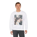 A cozy unisex heavy blend crewneck sweatshirt featuring a cat relaxing under palm trees