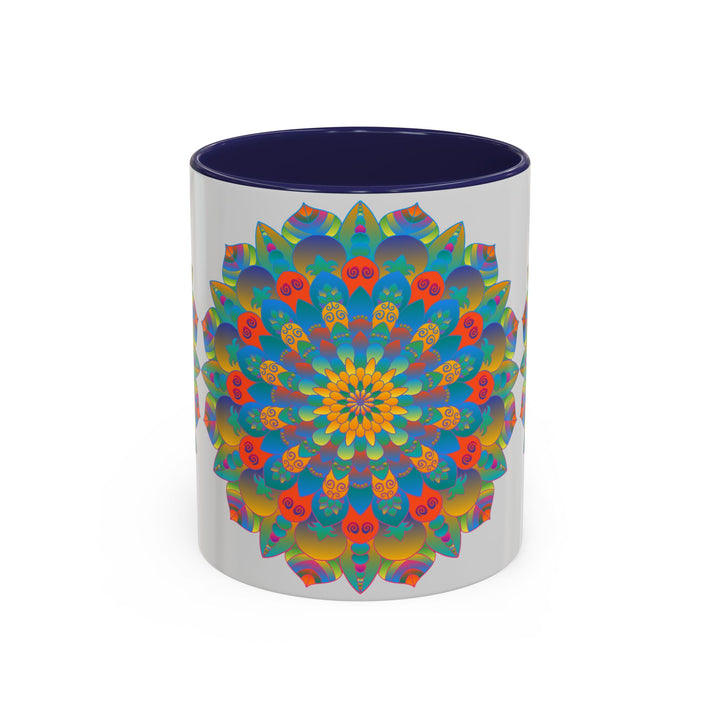 Handcrafted ceramic mug featuring a vibrant mandala art design in yellow, orange, and blue colors