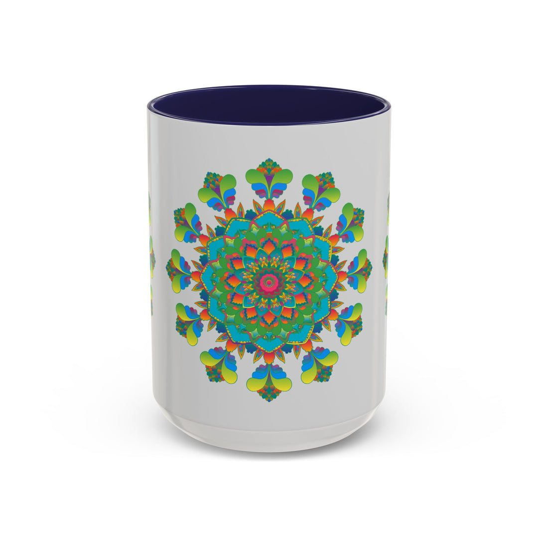 Colorful mandala art design on a ceramic mug, featuring vibrant hues on a sleek grey background