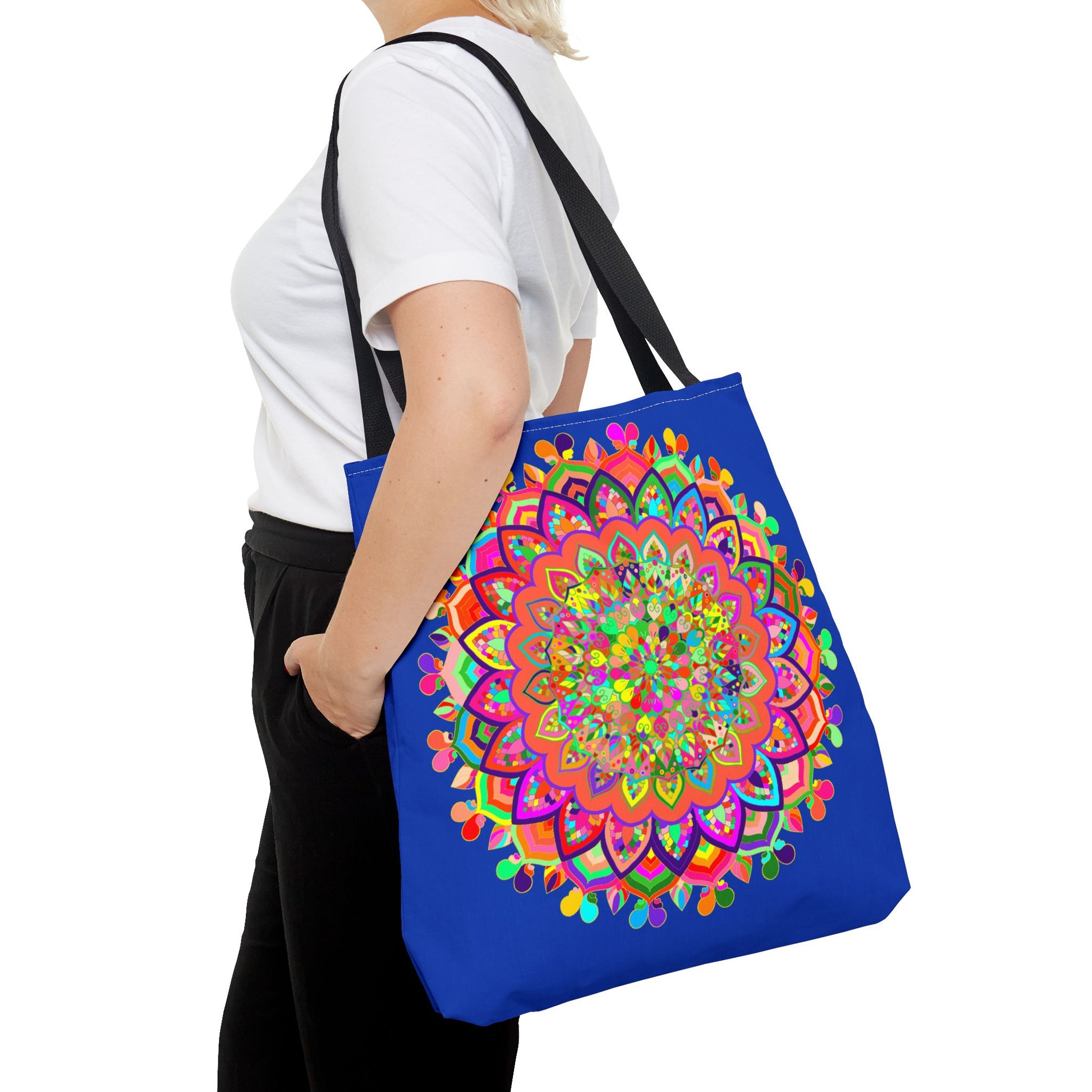 Dark blue tote bag with colorful mandala art design, perfect for carrying everyday essentials in style