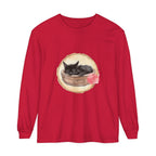 Watercolor painting of a peaceful sleeping cat in a bowl on a comfortable long sleeve t-shirt