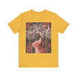 Adorable ginger cat lounging under a palm tree on a comfortable t-shirt