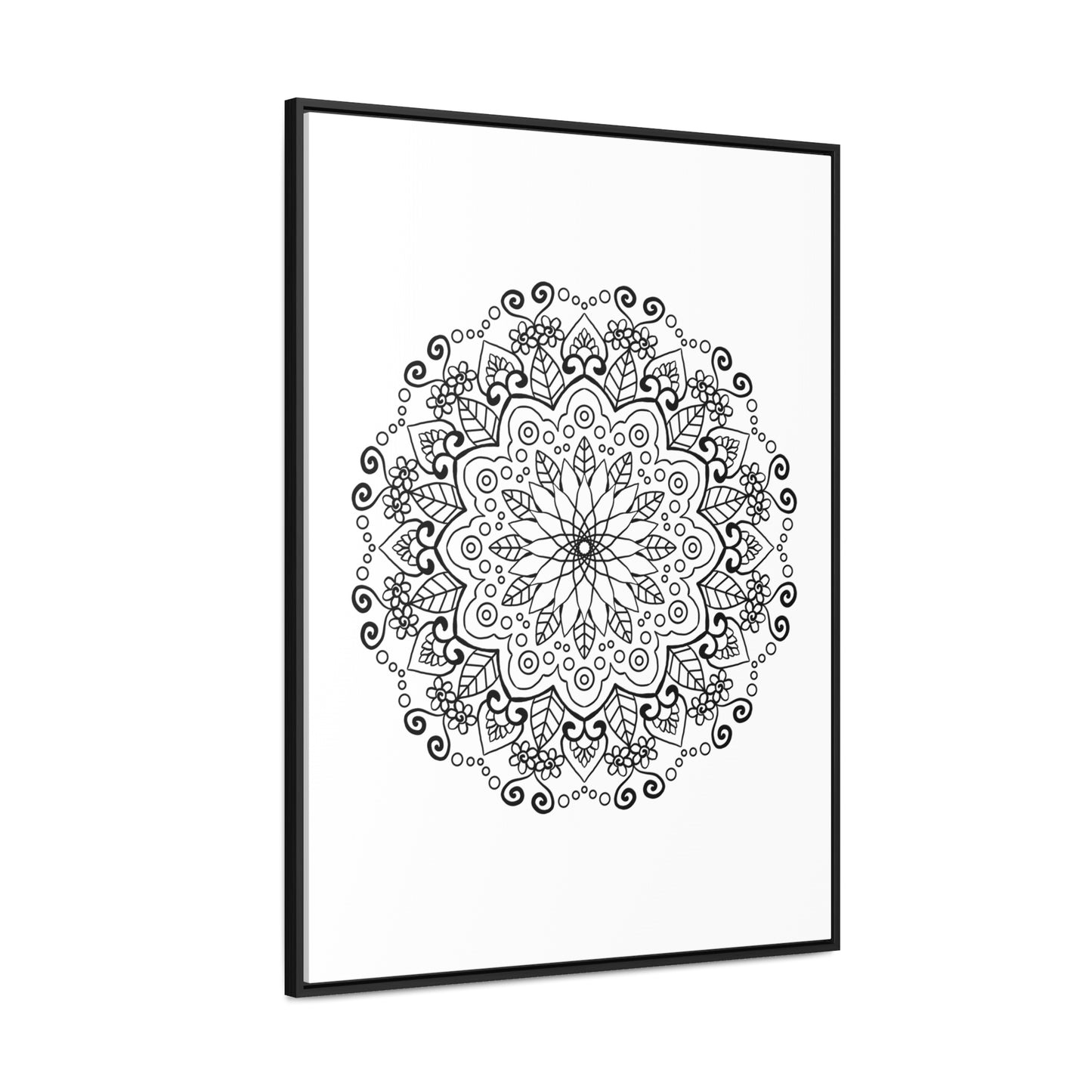 Handmade mandala art in black and white, displayed on gallery canvas wraps with a vertical frame