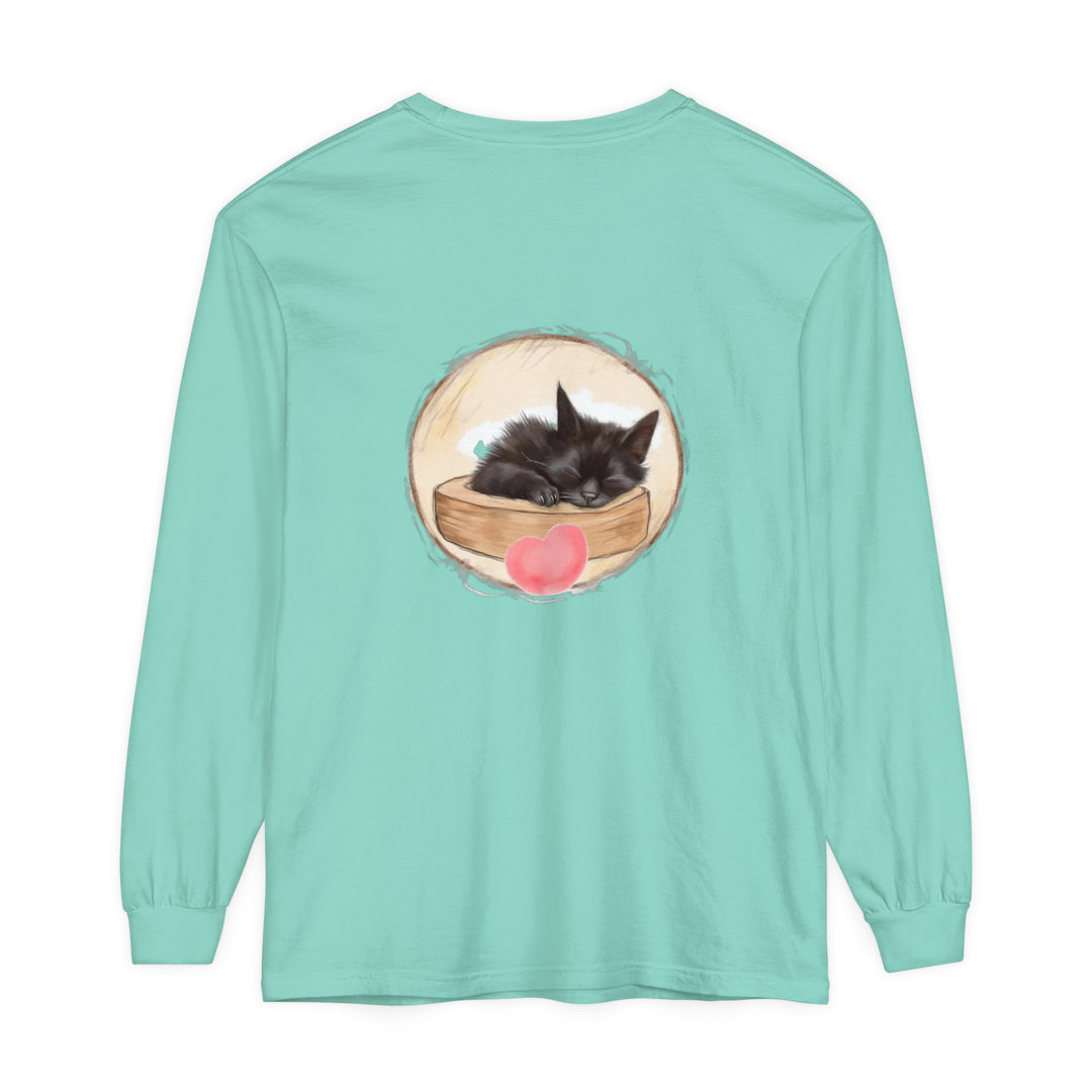 Adorable unisex t-shirt featuring a sleeping kitten, perfect for bedtime wear