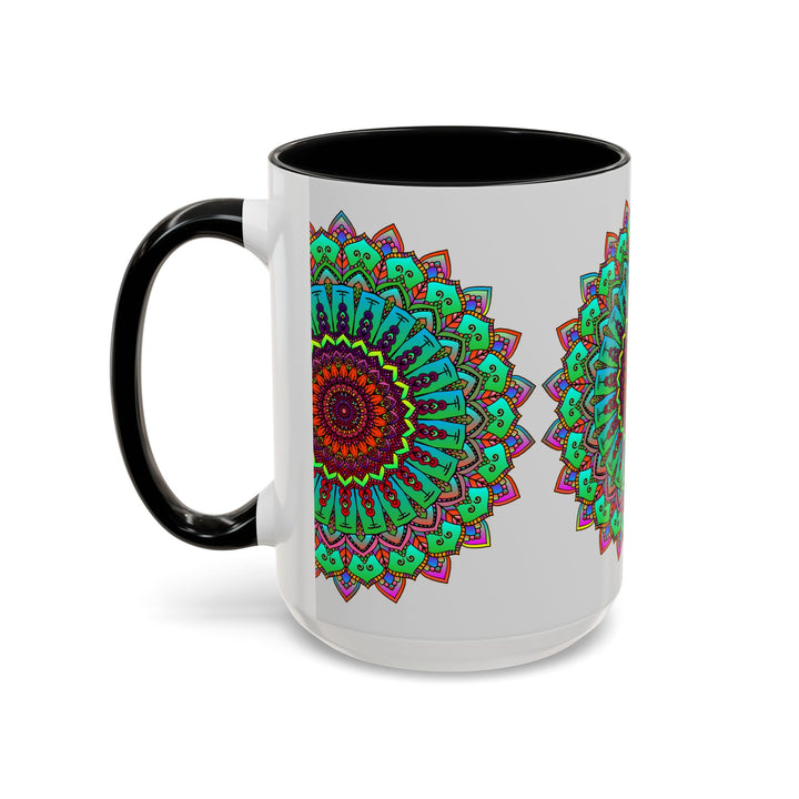 A light grey ceramic mug with a colorful mandala art design