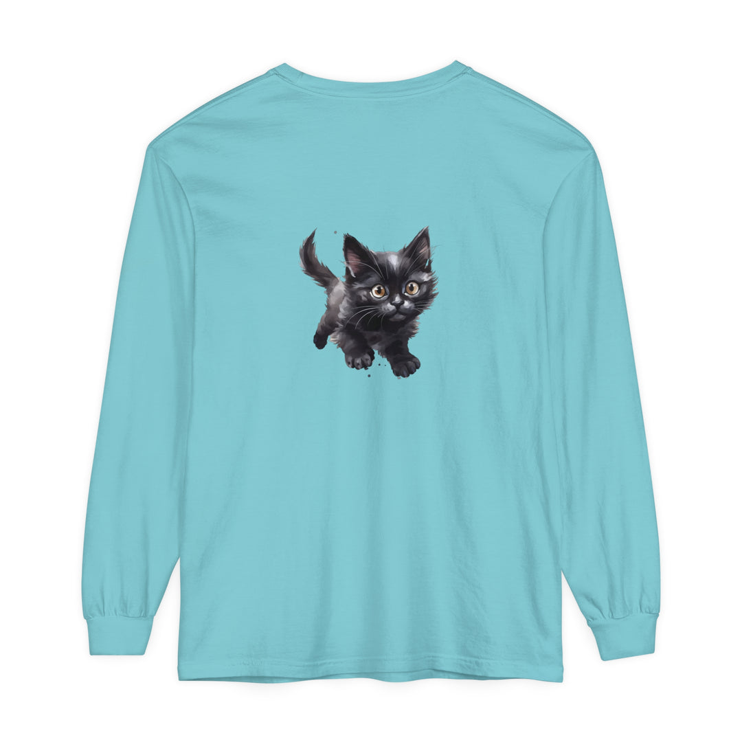 A charming watercolor illustration of a kitten playing with a ball on a t-shirt