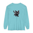 A charming watercolor illustration of a kitten playing with a ball on a t-shirt