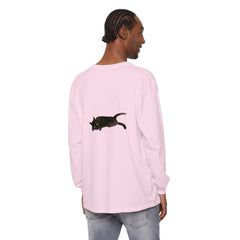 A black cat with yellow eyes sleeping on a unisex long sleeve t-shirt