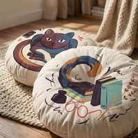 Dark Academia cat floor pillow, round tufted cushion in deep plum setting, close-up of the cat design with a cozy study vibe; lifestyle shot emphasizing warmth and quiet study moments