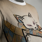 Navy-blue t-shirt featuring the Introvert Mosaic Cat design in mosaic style; lifestyle studio shot highlighting the cropped crescent-shaped cat made of tessellated tiles, with a soft, relaxed vibe.