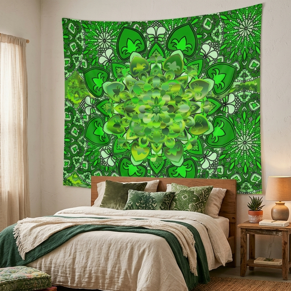 A large green wall tapestry featuring a detailed mandala and shamrock pattern, hanging on a bedroom wall above a bed with neutral-toned bedding.