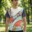 Navy blue t-shirt featuring a Spiral Cat Smile sacred geometry design in bold calligraphic lines; lifestyle studio setting, close-up shot of the chest graphic