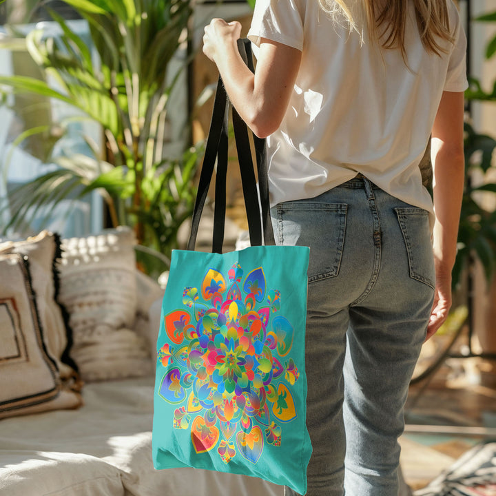 Back view of woman carrying the mandala lotus flower tote bag azure