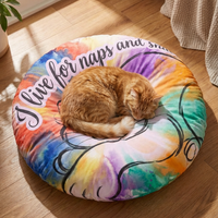 Winter cozy round floor pillow featuring a bright line-art cat in bold blue and warm accents; lifestyle flatlay showing the pillow on a rug with a cozy setting and natural light, highlighting a joyful nap vibe and cat-inspired design.
