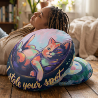 Round tufted floor pillow with a winter cozy cat design in navy background, Mint and coral fur accents, oil-paint style; lifestyle close-up showing a comfy seating corner.