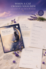 A styled flat-lay of a printable journal set titled 'When a Cat Crosses Your Path' with a purple sky cover, lavender sprigs, and several pages fanned out on a light textured surface. The cover shows a black cat sitting on a crescent moon, and the pages are cream-colored with printed journal prompts.