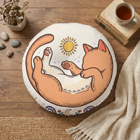Peach and yellow boho line-art cat on a round tufted floor pillow; lifestyle setting in a cozy living room, showcasing a calm, homey vibe suitable for product, lifestyle, or close-up views.
