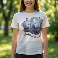 Dark navy t-shirt featuring Spiritual Rooftop Cat Calm double exposure design with a curling cat silhouette, rooftop, moon, and stars; lifestyle studio shot showing soft, natural lighting.